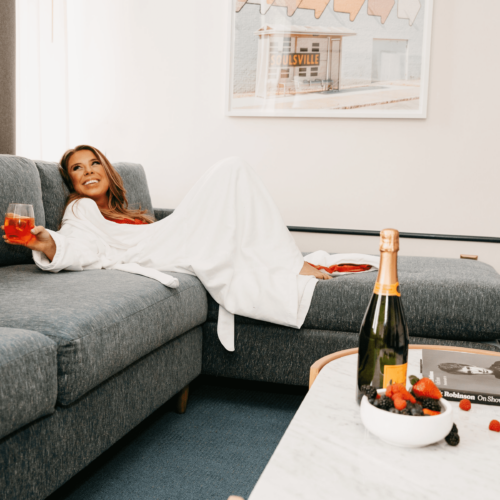 Woman Relaxing in Robe at Hu Hotel Memphis Suite